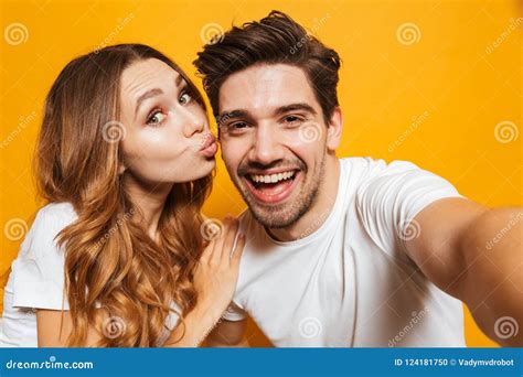 Portrait Of Caucasian Attractive Couple Man And Woman Taking Selfie