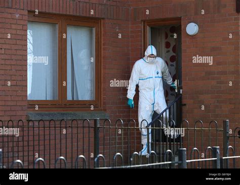 police forensic officers at a property on northcraig road in kilmarnock as officers are