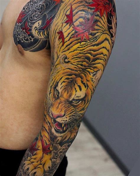 In many cases you will see the japanese tiger sleeve accompanied by other japanese symbols like cherry blossoms or waves. A tiger sleeve by Kenji Shigehara | Tiger tattoo sleeve ...