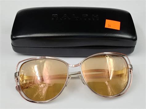 pair of michael kors sunglasses with case able auctions