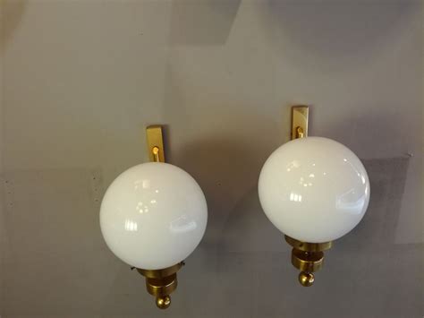 Our living room wall lights or bedroom wall lights are ideal for instilling your environment with soft, relaxing illumination and creating a warming, homely atmosphere. Vintage French Opaline Wall Light, 1970s for sale at Pamono