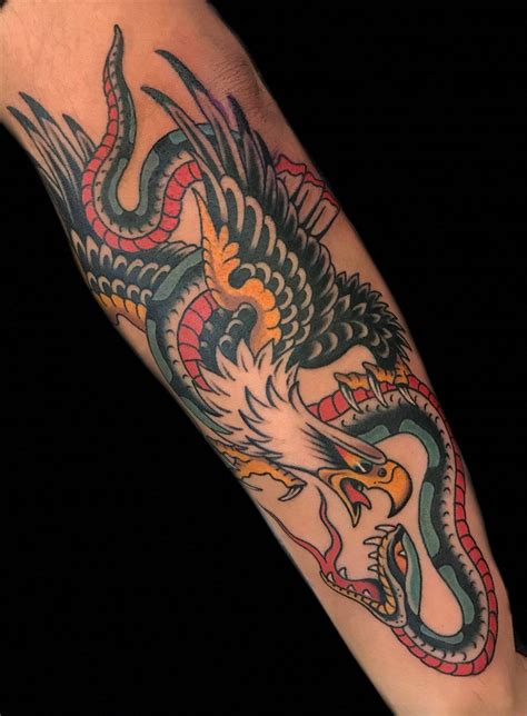 Https://tommynaija.com/tattoo/eagle And Snake Tattoo Designs