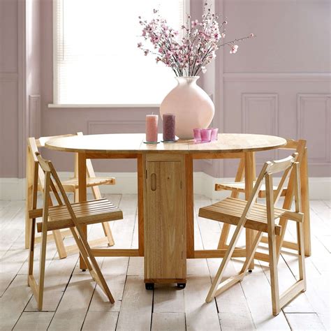 A nice wooden study desk makes the task of reading and writing much more comfortable, so let the creative mind in you be more productive. Choose a Folding Dining Table for a Small Space - Adorable Home