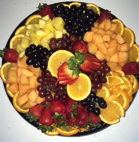Fruit Platter With Pineapple Oranges Grapes Strawberries And