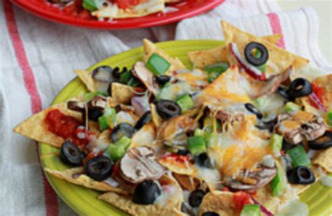 I love that the recipe is adaptable, too. Combination Pizza Nachos with Optional Sausage and ...