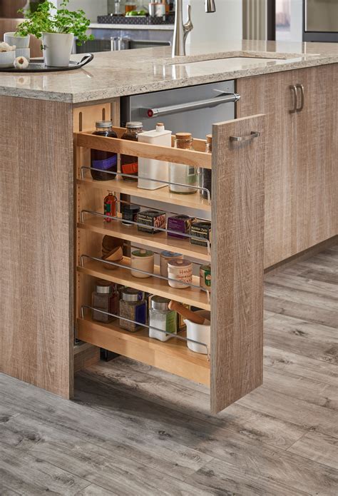 This pull out spice rack is 5 wide and made for 9 wide cabinets. Design-Craft Cabinets | Pull-Out Spice Rack Kitchen Cabinet