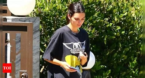 Kendall Jenner Experiments With A No Pants Look In Nyc Looks Stunning In A White Shirt With