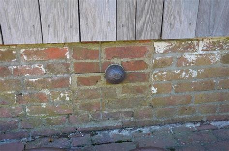 Small Iron Cannonball Stuck In Side Of Brick Building 11044939 Stock