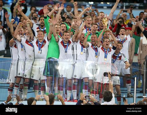 Germanys Philipp Lahm Lifts The World Cup And Celebrates Victory With