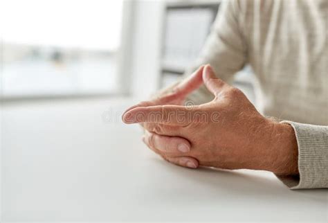 Close Up Of Senior Man Hands On Table Stock Photo Image Of Elderly