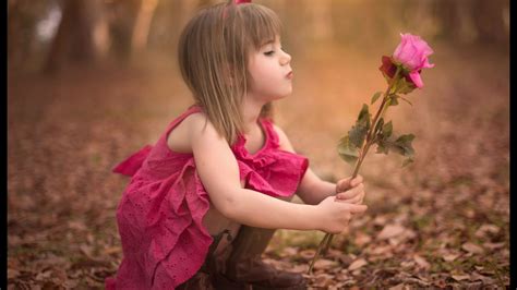 Beautiful Girl Baby With Pink Dress Is Holding Rose On Hand Hd Cute