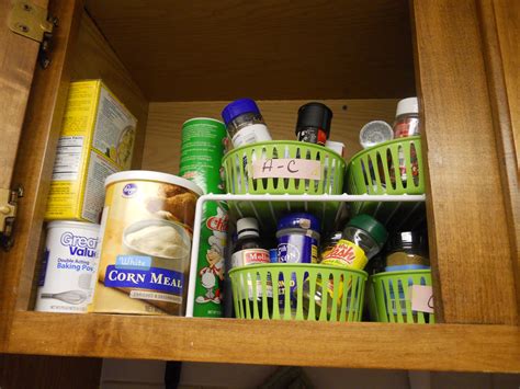 They are all now in alphabetical order. Spice cabinet organized with dollar store baskets. I put ...