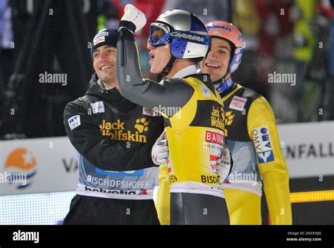 Austria S Thomas Morgenstern Center Celebrates With His Team Mates Wolfgang Loitzl Left And