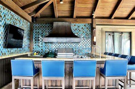 Mediterranean Style Outdoor Kitchen With Blue Moroccan Tile Backsplash