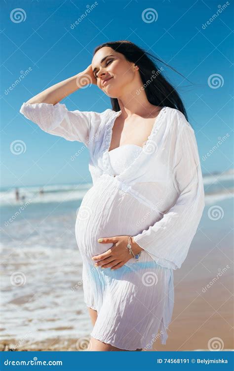 Pregnant Woman In Bikini Posing Against Sea Stock Image My Xxx Hot Girl