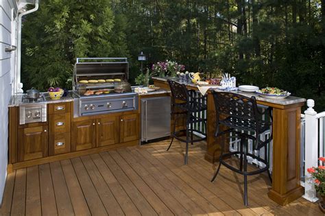 An outdoor kitchen can turn your backyard into party central and increase your home's value. Outdoor Kitchen Kits | hac0.com