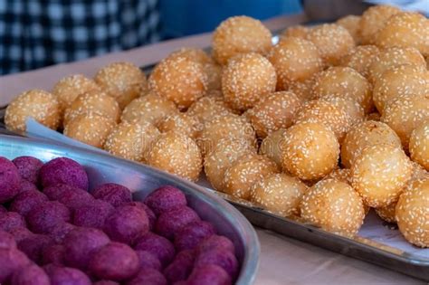 Thai Traditional Dessert Deep Fried Sesame Balls And Deep Fried Sweet Potato Balls On Stainless