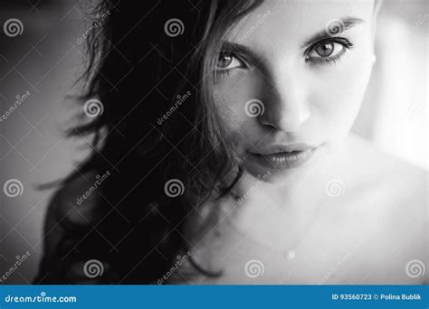 Portrait Of A Beautiful Young Brunette Girl With Expressive Eyes And