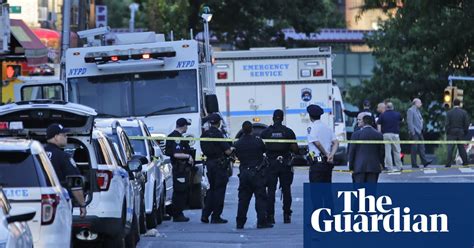 Nypd Officer Fatally Shot In Car By Man Later Killed By Police Us News The Guardian