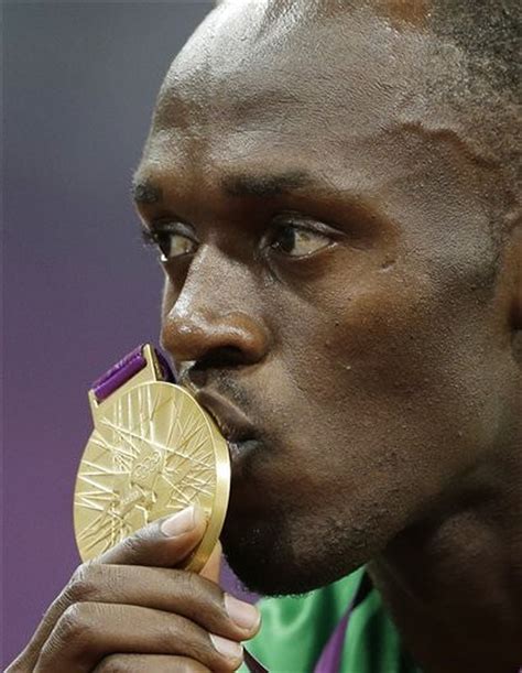 olympic sprint champ usain bolt critical of u s track legend carl lewis