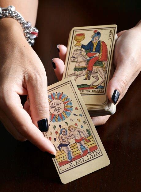 Premium Photo Fortune Teller Showing Vintage Tarot Cards