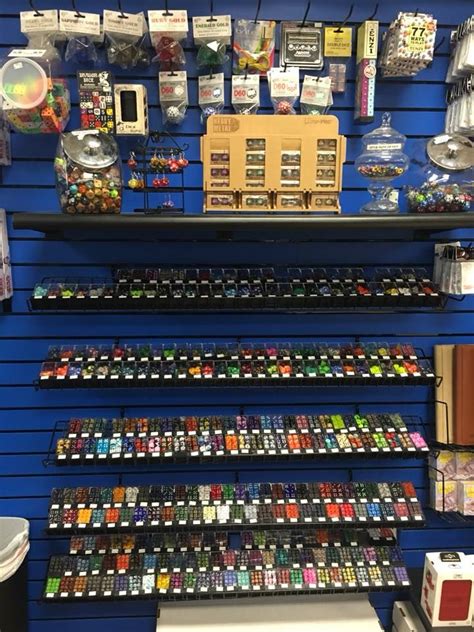 Maybe you would like to learn more about one of these? Game Store Merchandising: Dice image by Cat & Mouse Game ...