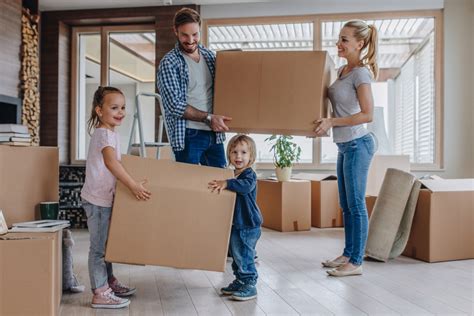 Young happy family moving into a new house. - Consumer Energy Alliance