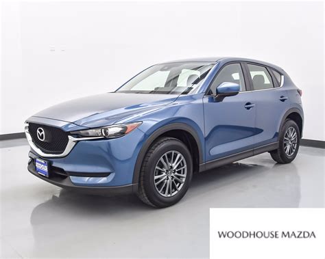 When the sport mode is selected, driving at higher engine speeds increases and it may increase fuel consumption. Pre-Owned 2017 Mazda CX-5 Sport Sport Utility in Omaha # ...