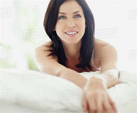 Sexy Woman Lying On Bed Stock Photo Dissolve