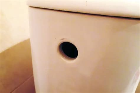 why do i need a side hole on the toilet bowl about plumbing just