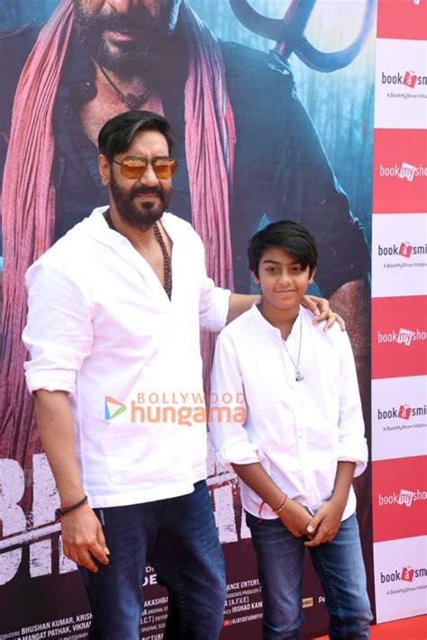 Photos Ajay Devgn And Snapped With His Son At A Screening Of Bholaa 2