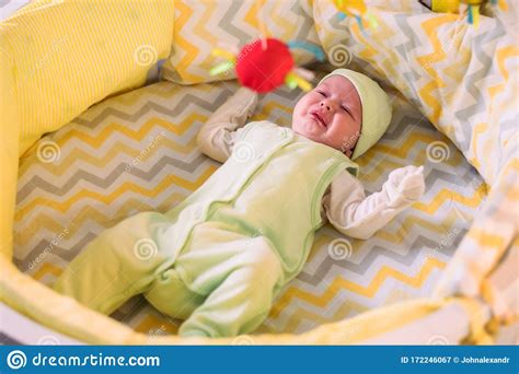 Cute Newborn Baby Crying In The Crib Stock Image Image Of Beautiful