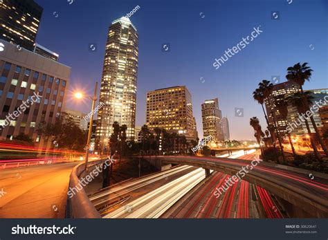 Freeway Traffic In Downtown Los Angeles At Night Stock