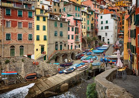Some of the other towns experienced devastating flash floods , but riomaggiore's high altitude allowed it to escape with less damage. Surroundings of Levanto: Riomaggiore, the farthest fo ...