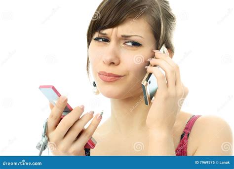Busy Unhappy Beautiful Woman With Two Cellphones Stock Image Image Of