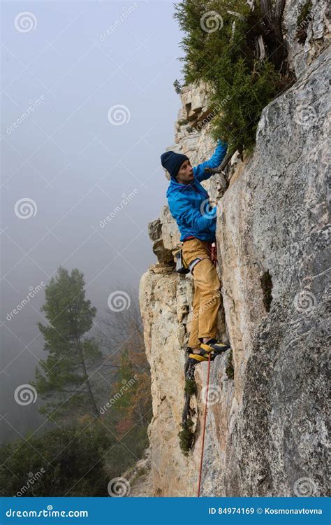 Rock Climber Climbing In Beautiful Rocky Area Adventure Sport Concept