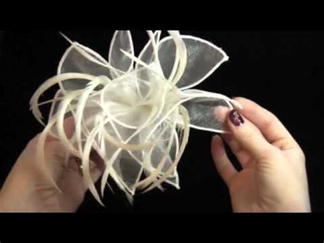 Depends on which part you're trying to adhere. Large Cream Looped Fabric and Feather Fascinator on a ...