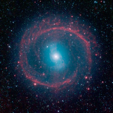 Nasas Spitzer Space Telescope Captures Image Of Distant Ringed Galaxy