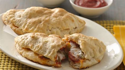 As a disclaimer, the chicken must be fully cooked before baking your calzone. Chicken Sausage Calzones for Two Recipe - Pillsbury.com