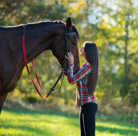 Beautiful Long Hair Young Woman Riding A Horse Stock Photo Image Of