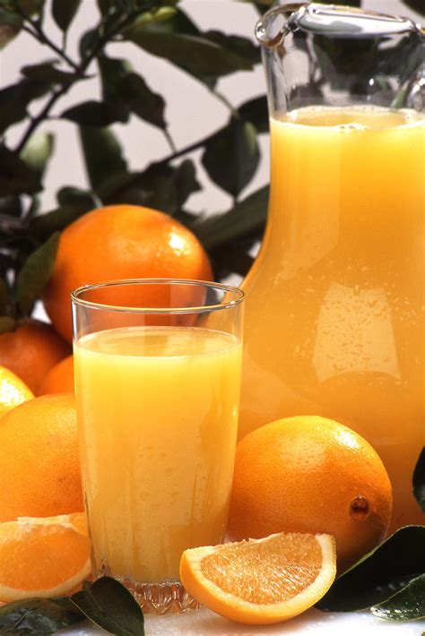 K7237 14 Fresh Orange Juice And Oranges Are Displayed On D Flickr