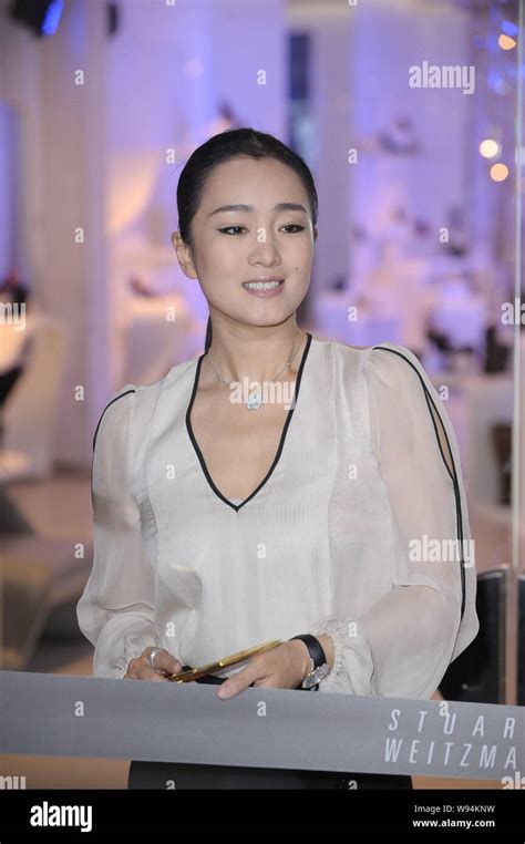 Chinese Actress Gong Li Cuts The Ribbon During The Opening Ceremony For