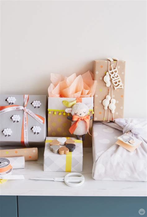 Need to get myself more baby wraps! Baby gift wrap ideas: Showered with love - Think.Make ...
