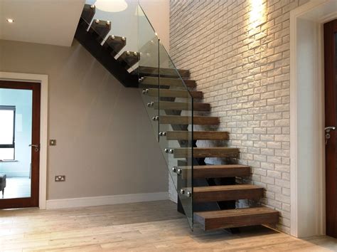 Steel spine stairs - Designed and Fitted by AJD for Customer in Cork , Ireland