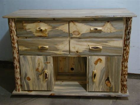 This uniqueness and color of the wood has become widely recognizable, and synonymous with colorado living. Beetle Kill Pine Cabinet. I want something like this for ...