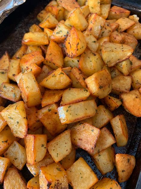Place potatoes into the baking dish and toss to coat with olive oil. Perfectly Seasoned Roasted Potatoes - Daily Recipes