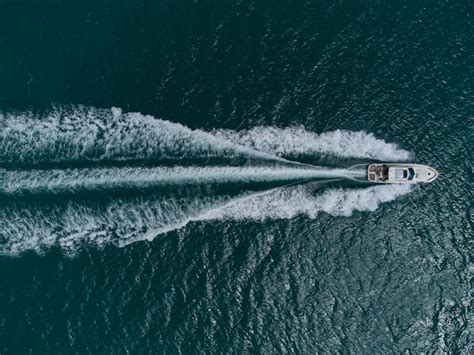 Premium Photo Aerial Top Down View Of Speed Motor Boat On Open Sea At