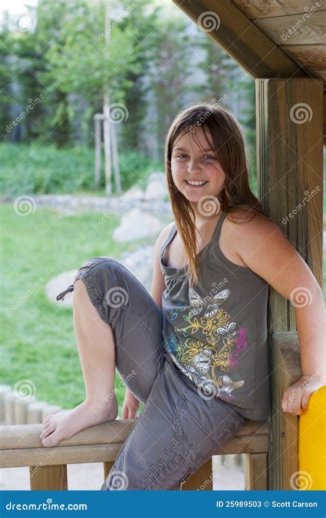 Young Girl Sitting On Rail Stock Image Image Of Park 25989503