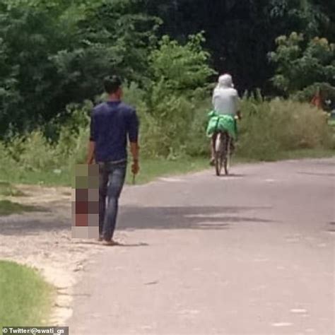 chilling moment brother carries his 18 year old sister s severed head to a police station in a