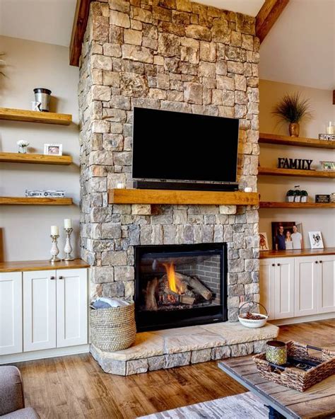 A Cozy Neutral Living Room Spruced Up With A Stone Fireplace A Wooden